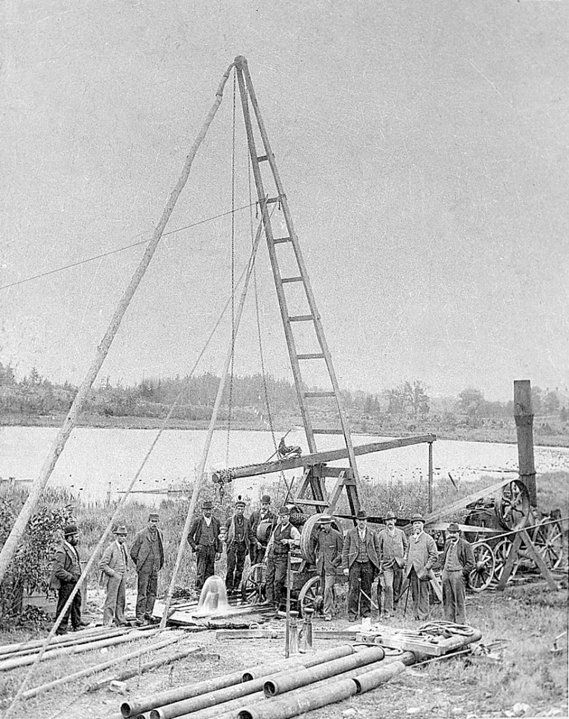 Photo of persons drilling a well near Shoemaker Pond, Berlin in 1899.