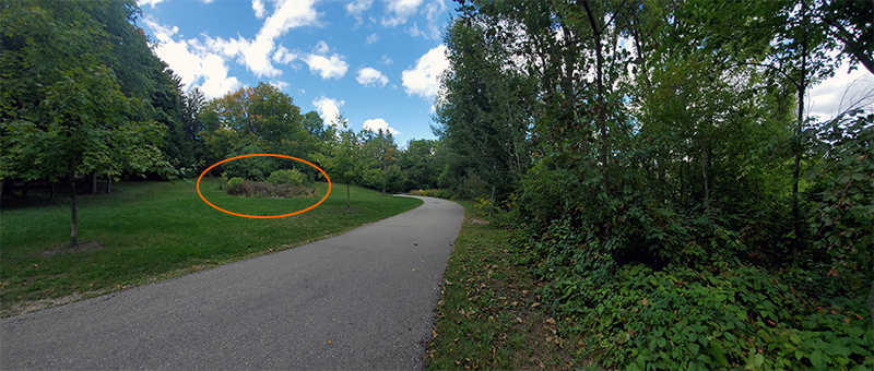 Photo of Lakeside Park path showing location of foundation for original water supply plant.